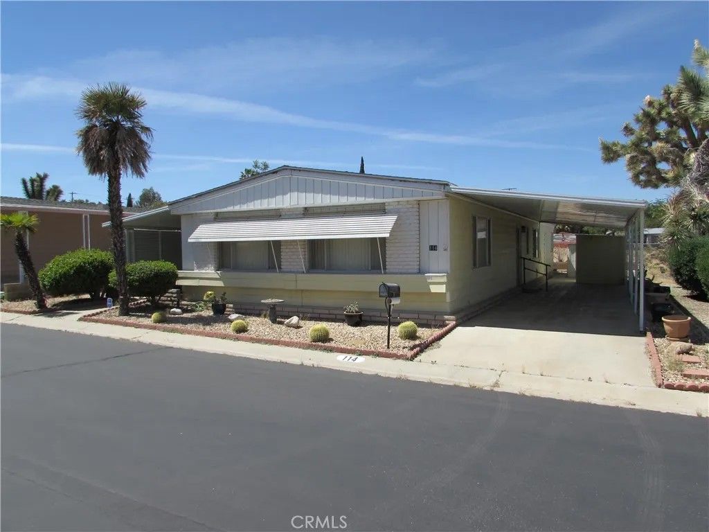 Photo of 7501 Palm Ave #114, Yucca Valley, CA 92284 (MLS # HD26076630)
