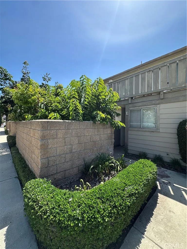 Photo of 5130 W 1st ST #E, Santa Ana, CA 92703 (MLS # IV26163057)