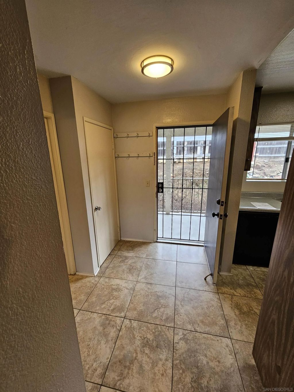 Photo of 6675 Mission Gorge Rd #A202, San San Diego, CA 92120 (MLS # 260004166)