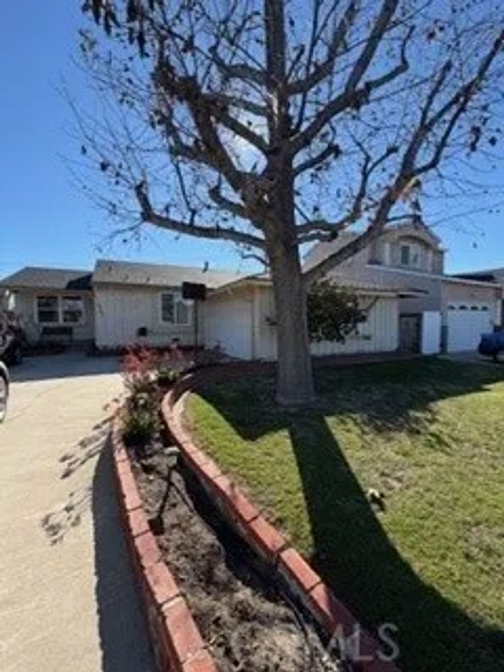 Photo of 14568 Reis Street, Whittier, CA 90604 (MLS # PW26044692)