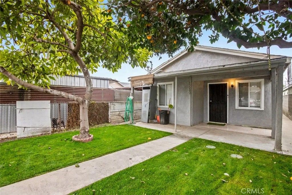 Photo of 13202 S Penrose Ave, Compton, CA 90222 (MLS # DW25279454)
