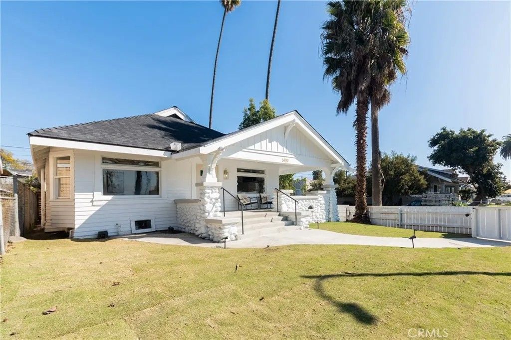 Photo of 3890 S Harvard Boulevard, Los Angeles, CA 90062 (MLS # PW26086335)