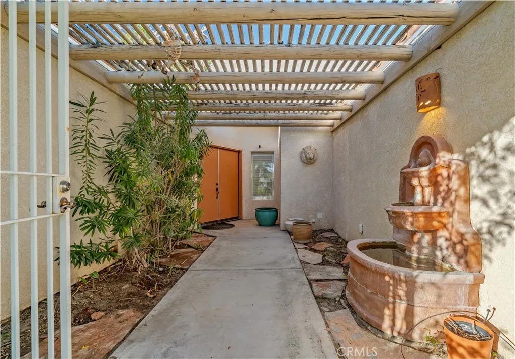 Photo of 1820 E Racquet Club Road, Palm Springs, CA 92262 (MLS # GD26102013)