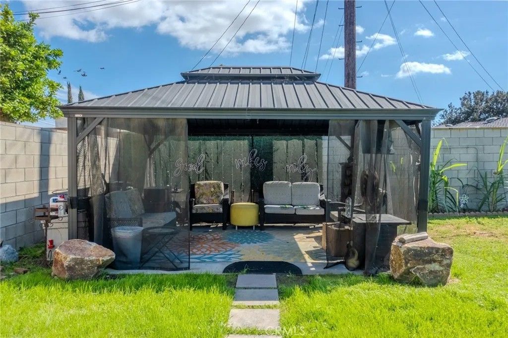 Photo of 128 E 67th, Long Beach, CA 90805 (MLS # OC26072483)