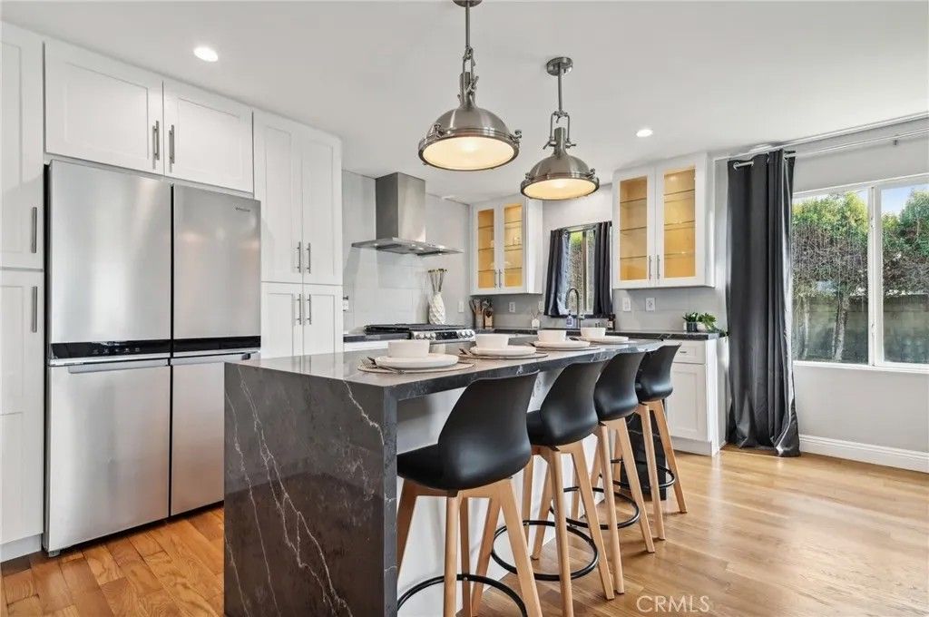 Photo of 8205 Arnett St, Downey, CA 90241 (MLS # PW26004556)