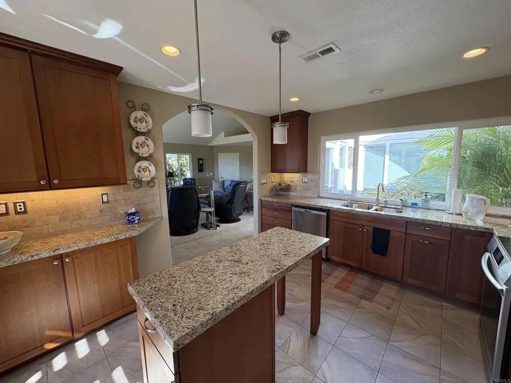 Photo of 4913 Alicante Way, Oceanside, CA 92056 (MLS # NDP2600907)