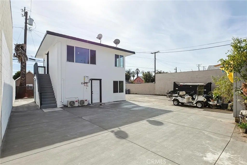 Photo of 440 W Holt Ave, Pomona, CA 91768 (MLS # RS26037101)