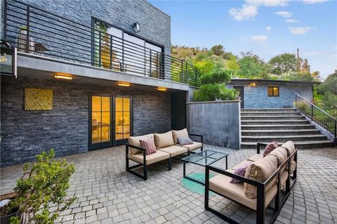 Tiny photo for 7582 McGroarty Terrace, Los Angeles, CA 91042 (MLS # SR25249992)