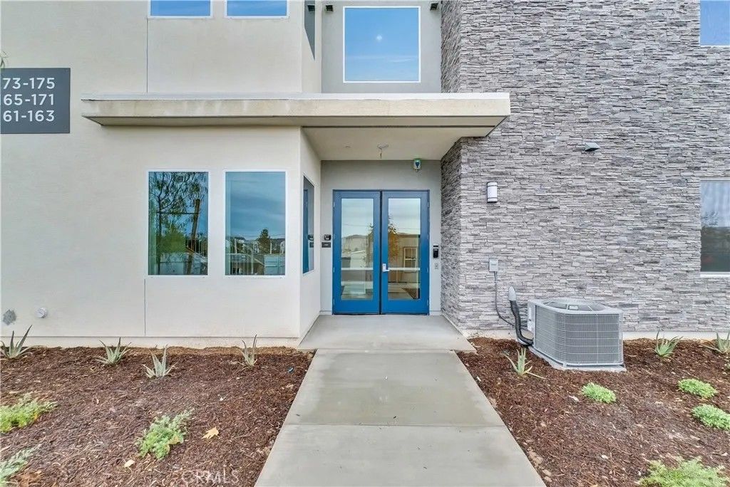 Photo of 165 Baluster, Irvine, CA 92618 (MLS # OC26013163)