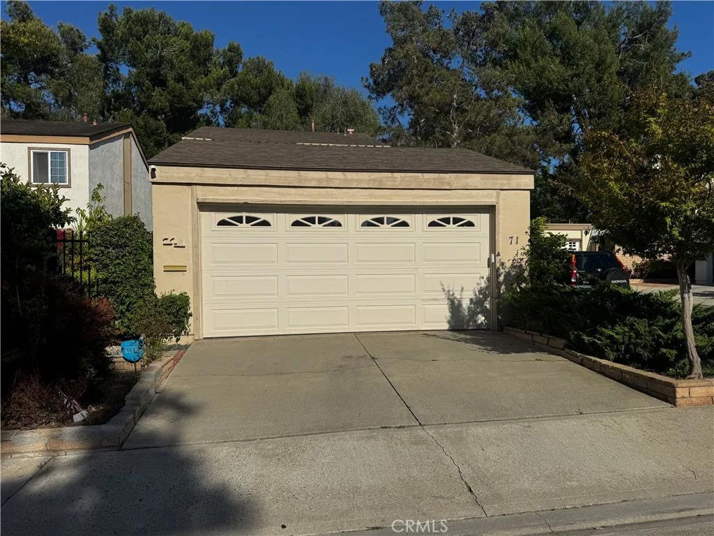 Photo of 71 Willow Tree LN, Irvine, CA 92612 (MLS # OC26150420)