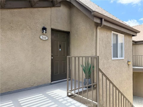 Photo of 788 Gianni DR #202, Corona, CA 92879 (MLS # OC26140894)