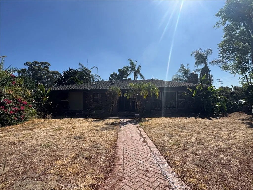 Photo of 3015 Pepper Tree Lane, San Bernardino, CA 92404 (MLS # IG26196924)