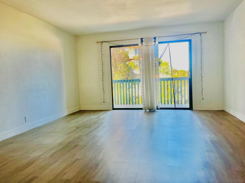Photo of 4950 Lantana Dr #4, San Diego, CA 92105 (MLS # 260008828)