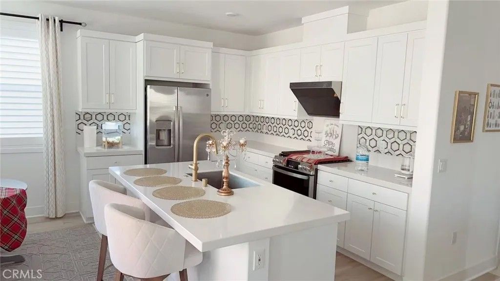 Photo of 426 Lobata, Irvine, CA 92618 (MLS # OC26086643)