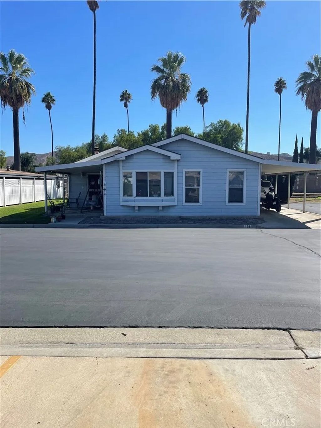 Photo of 13381 Magnolia Ave #168, Corona, CA 92879 (MLS # IG25237691)