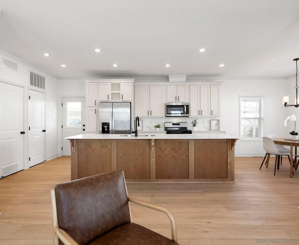 Photo of 7025 San Bartolo St #42, Carlsbad, CA 92011 (MLS # 250041242)