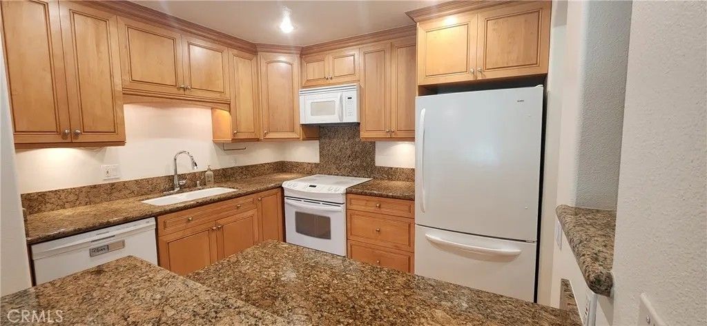 Photo of 101 Scholz Plz #223, Newport Beach, CA 92663 (MLS # NP26079349)