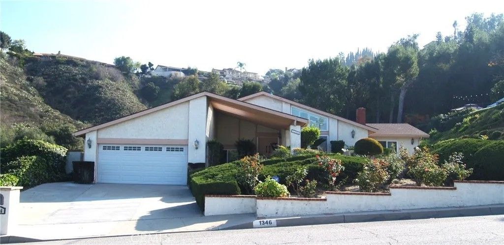 Photo of 1346 S South Hills Drive, West Covina, CA 91791 (MLS # CV25270000)