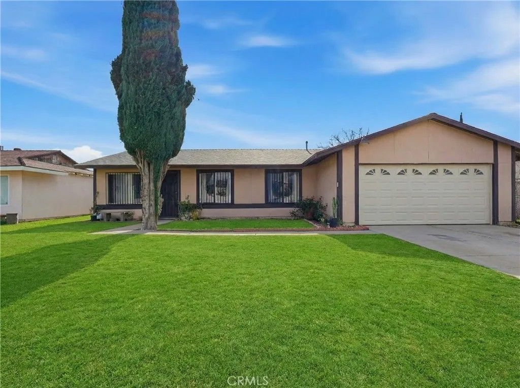 Photo of 645 W Winchester Dr, Rialto, CA 92376 (MLS # CV26000977)