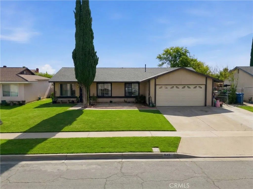 Photo of 645 W Winchester Dr, Rialto, CA 92376 (MLS # CV26000977)