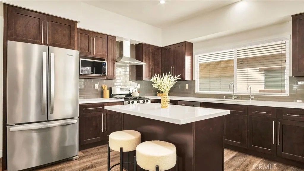 Photo of 9237 Wakefield Avenue #11, Panorama City, CA 91402 (MLS # SR26068580)