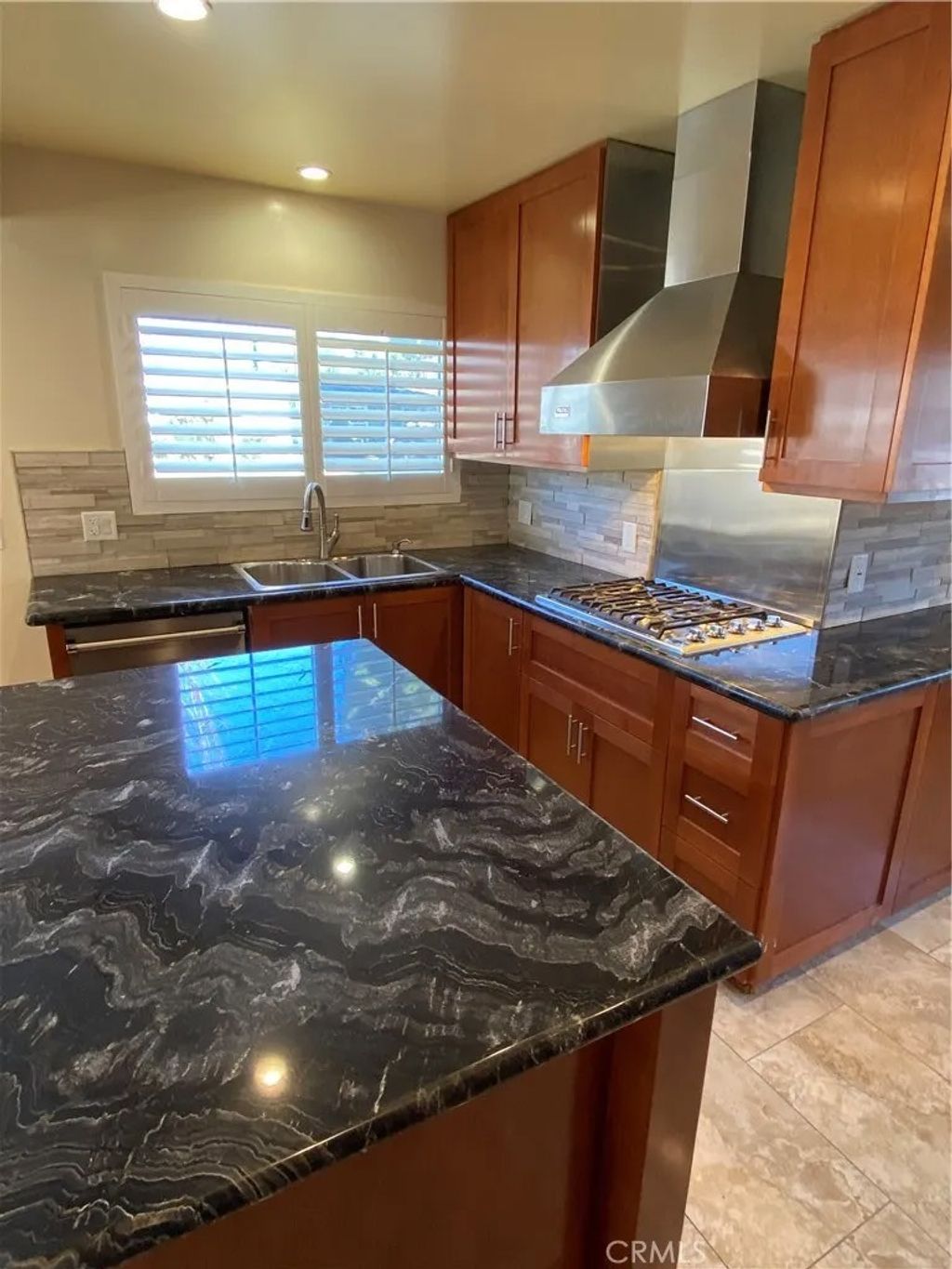 Photo of 9813 Rhea Avenue, Northridge, CA 91324 (MLS # SR26023406)