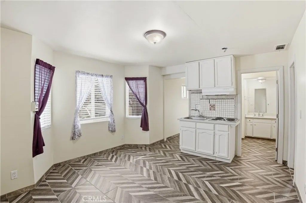 Photo of 1581 Chanticleer Rd #B, Anaheim, CA 92802 (MLS # HD26037649)