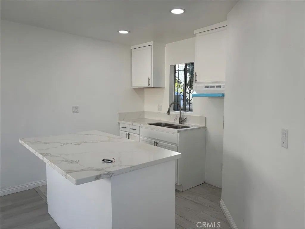 Photo of 1415 N Spring, Compton, CA 90221 (MLS # DW25280358)