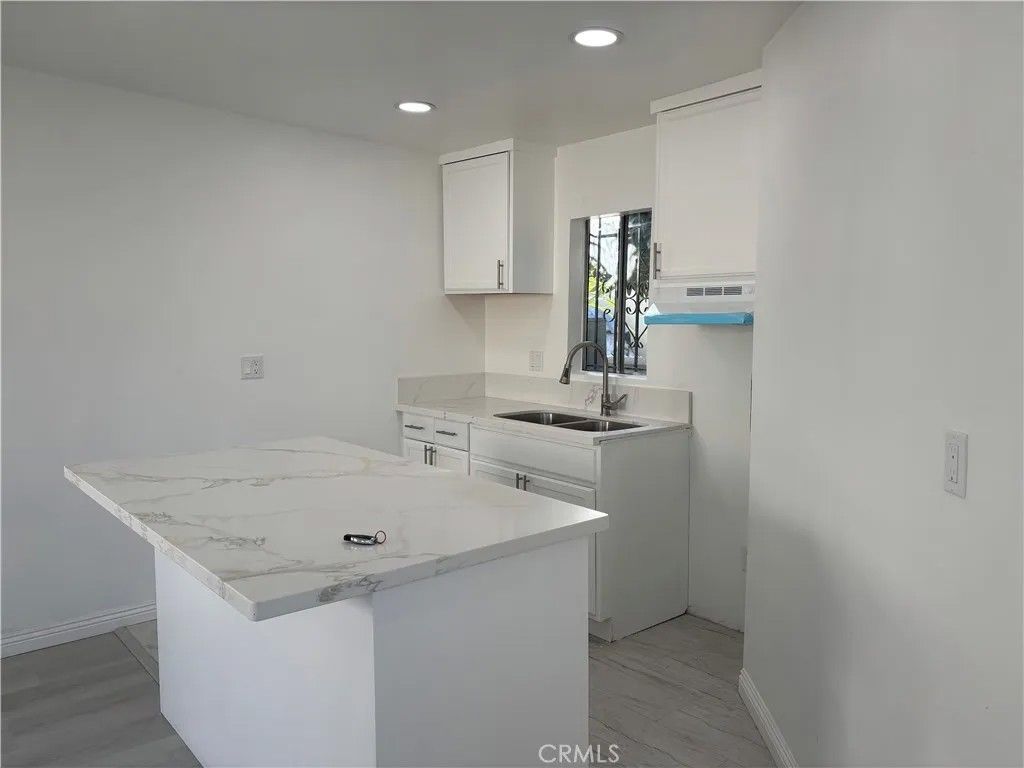 Photo of 1415 N Spring, Compton, CA 90221 (MLS # DW25280358)
