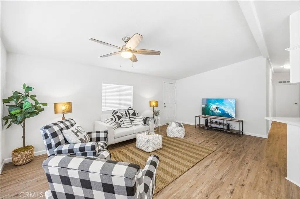 Photo of 21851 Newland Street #104, Huntington Beach, CA 92646 (MLS # LG26061622)