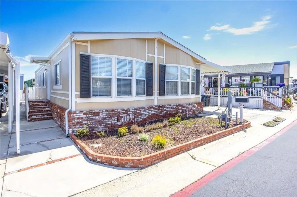 Photo of 21851 Newland Street #104, Huntington Beach, CA 92646 (MLS # LG26061622)