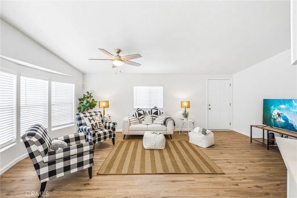 Photo of 21851 Newland Street #104, Huntington Beach, CA 92646 (MLS # LG26061622)