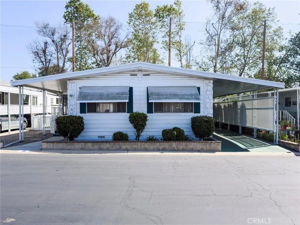 Photo of 24921 Muirlands Boulevard #28, Lake Forest, CA 92630 (MLS # PW26050648)