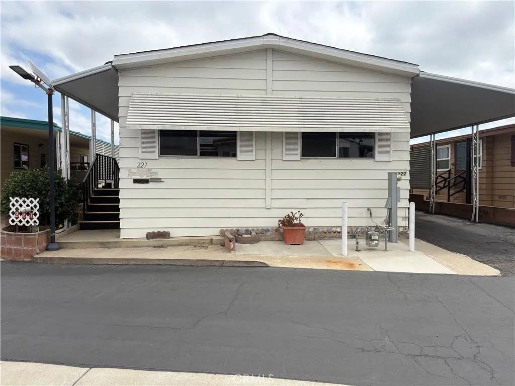 Photo of 227 Bluebird Lane, Oceanside, CA 92057 (MLS # ND26179656)