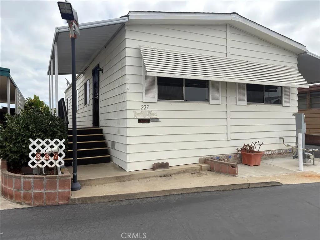 Photo of 227 Bluebird Lane, Oceanside, CA 92057 (MLS # ND26179656)