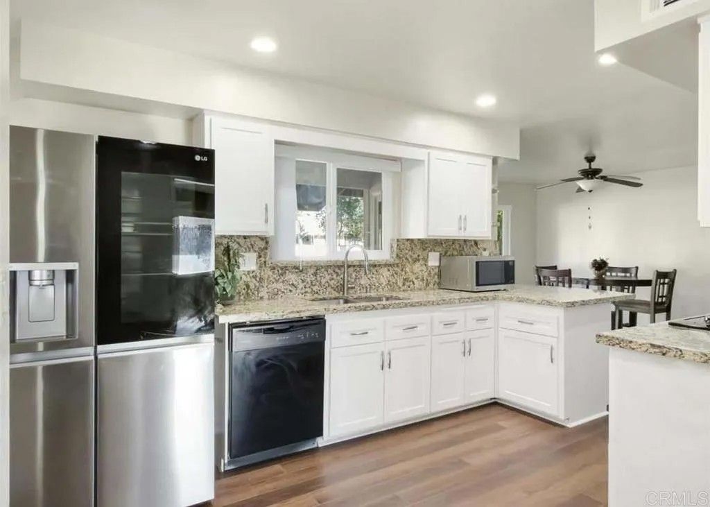 Photo of 29130 Pebble Beach Drive, Menifee, CA 92586 (MLS # PTP2602409)