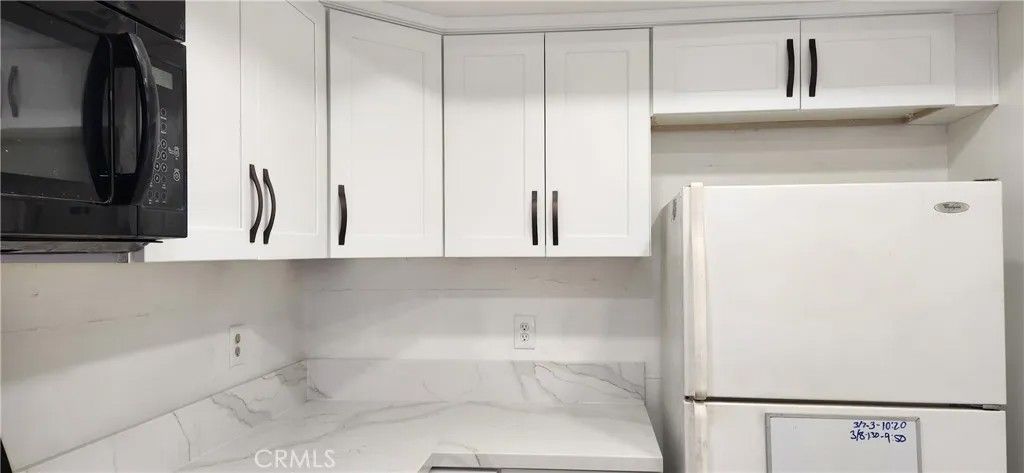 Photo of 713 Walnut Drive, Lake Elsinore, CA 92530 (MLS # OC25240332)