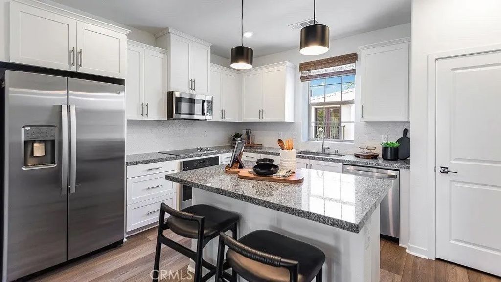 Photo of 8437 Tapia Way, Rancho Cucamonga, CA 91730 (MLS # SW26062640)