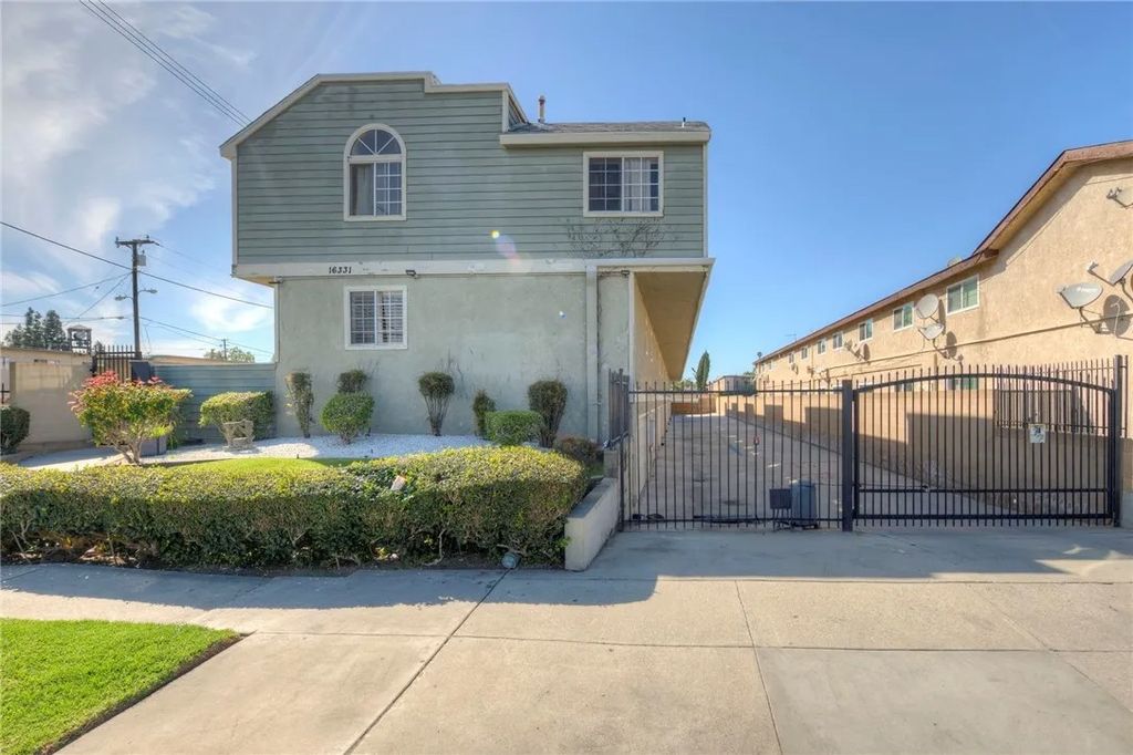 Photo of 16331 Cornuta Avenue #E, Bellflower, CA 90706 (MLS # RS26047613)