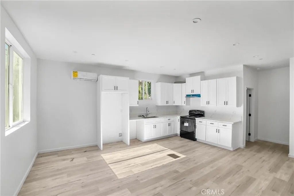 Photo of 20538 Enadia Way, Winnetka, CA 91306 (MLS # SR25271657)