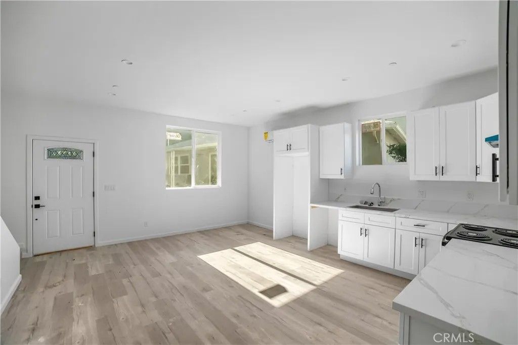 Photo of 20538 Enadia Way, Winnetka, CA 91306 (MLS # SR25271657)