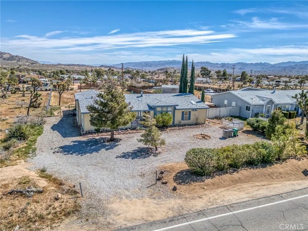 Photo of 4837 Avalon Ave, Yucca Valley, CA 92284 (MLS # JT26057601)