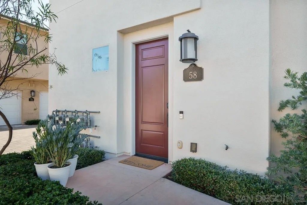 Photo of 16750 Coyote Bush Dr #58, San Diego, CA 92127 (MLS # 260003035)