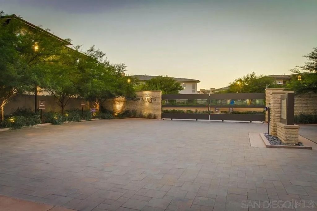 Photo of 16750 Coyote Bush Dr #58, San Diego, CA 92127 (MLS # 260003035)