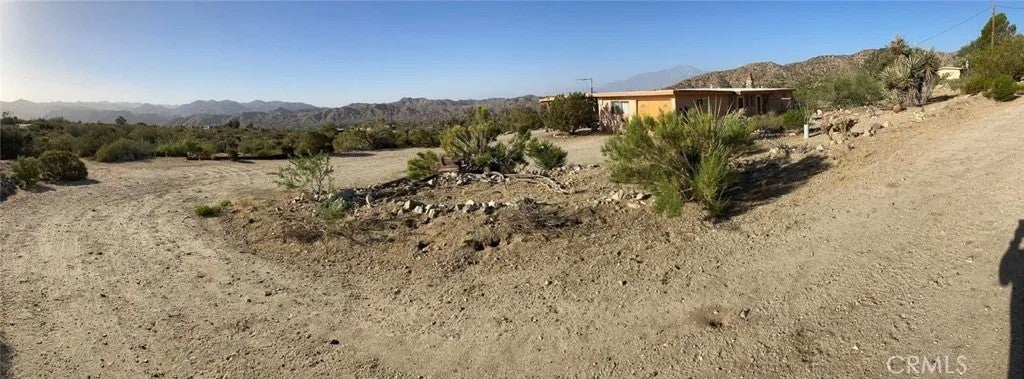 Photo of 50557 Cheyenne TRL, Morongo Valley, CA 92256 (MLS # OC26231386)