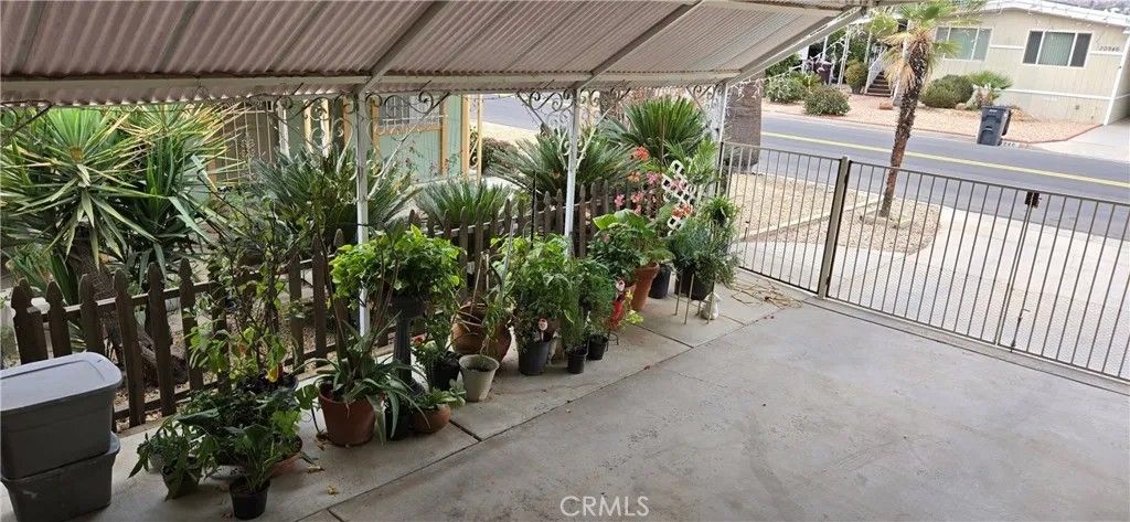 Photo of 30949 Palmetto Palm Avenue, Homeland, CA 92548 (MLS # IV26057149)