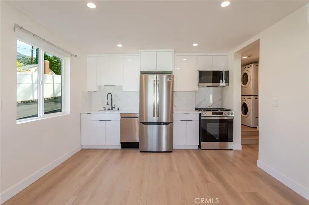 Photo of 10421 Pinyon Avenue, Tujunga, CA 91042 (MLS # GD26068331)