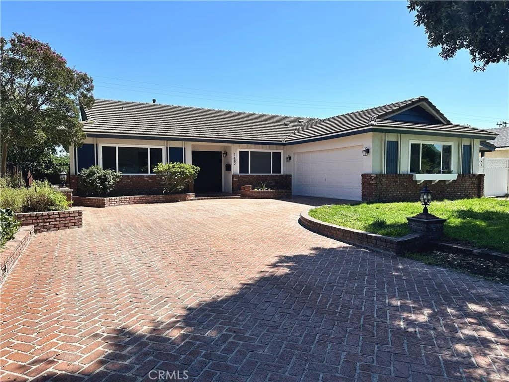 Photo of 1482 Elmcroft Avenue, Pomona, CA 91767 (MLS # TR26134068)