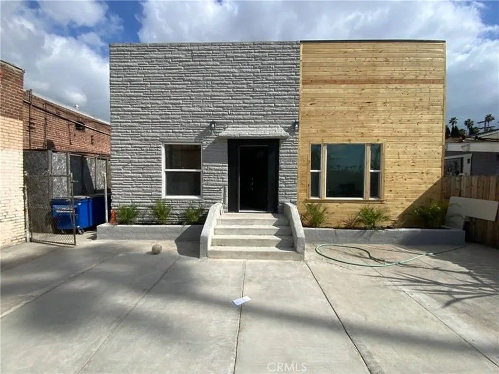 Photo of 4804 S Van Ness Ave, Los Angeles, CA 90062 (MLS # DW26089857)