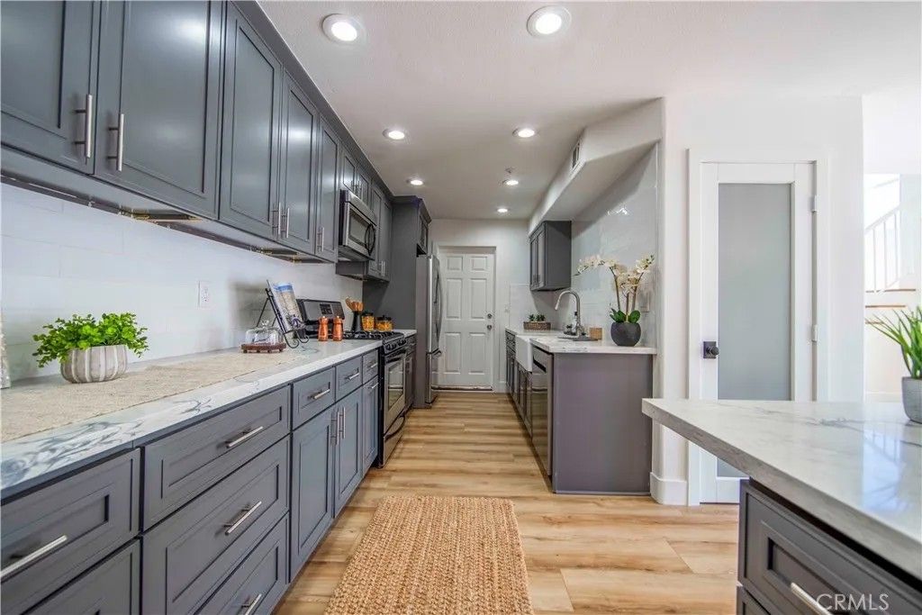 Photo of 18859 Milos Circle, Huntington Beach, CA 92648 (MLS # OC25234904)